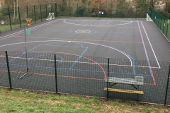 MUGA and concrete steps to a school in Haywards Heath