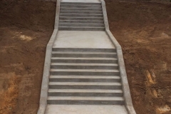 MUGA and concrete steps to a school in Haywards Heath